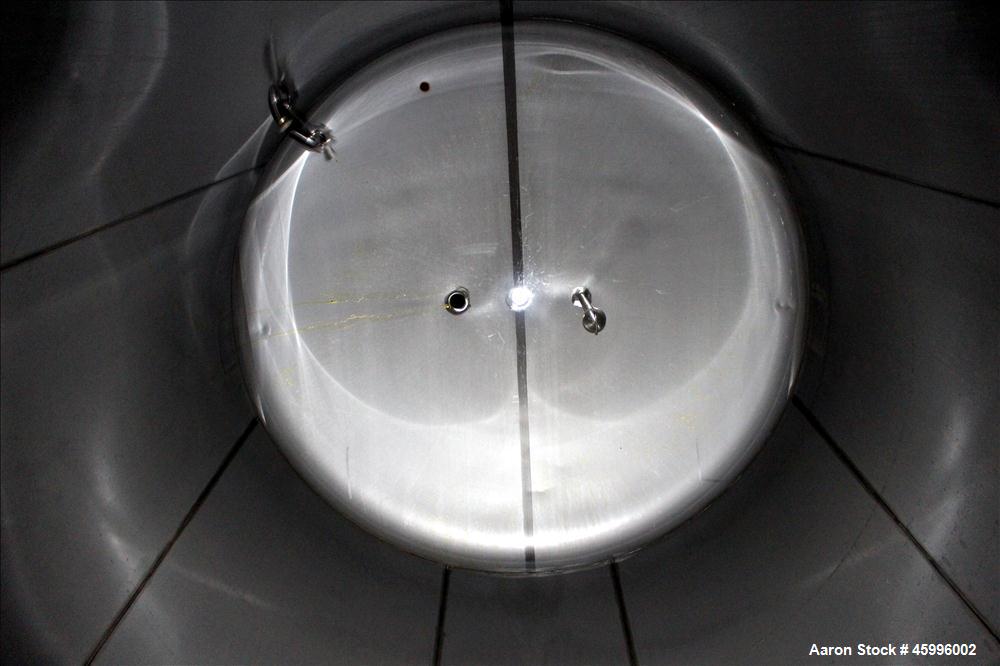 Used Walker Stainless Tank, Model SS, 6,000 Gallon, 304 Stainless Steel, Vertical. 102" Diameter x 168" straight side. Dished top and bottom heads. Internal rated atmospheric psi at ambient degrees F...