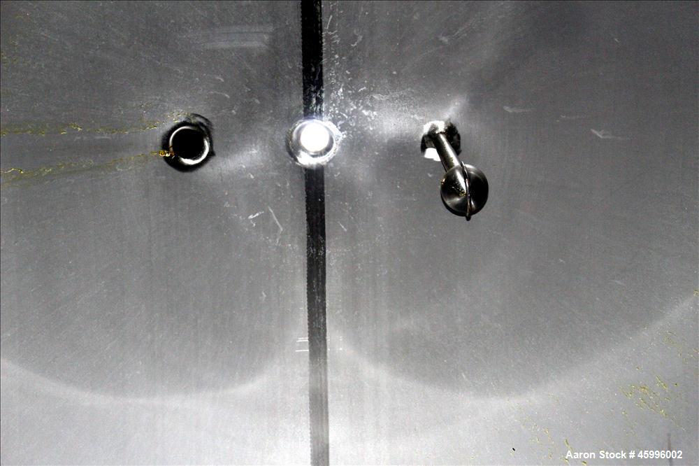 Used Walker Stainless Tank, Model SS, 6,000 Gallon, 304 Stainless Steel, Vertical. 102" Diameter x 168" straight side. Dished top and bottom heads. Internal rated atmospheric psi at ambient degrees F...