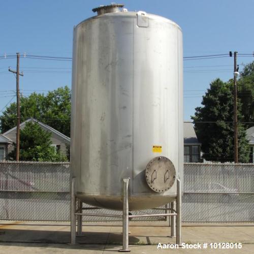 Used- Walker 5000 Gallon 304 Stainless Steel Vertical Tank. This tank has a dome top and a dish bottom. The tank diameter is...