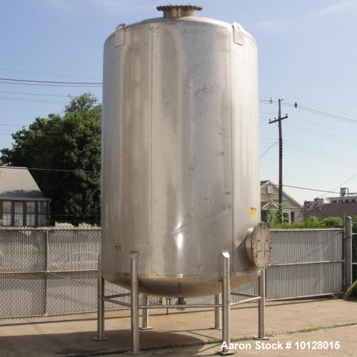 Used Walker 5000 Gallon 304 Stainless Steel Vertical Tank. This tank has a dome top and a dish bottom. The tank diameter is 102", the overall height is 210", the dome top is 18", the dish bottom is 1...
