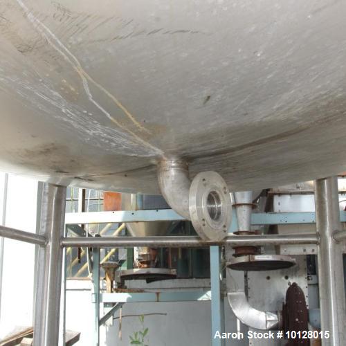 Used Walker 5000 Gallon 304 Stainless Steel Vertical Tank. This tank has a dome top and a dish bottom. The tank diameter is 102", the overall height is 210", the dome top is 18", the dish bottom is 1...