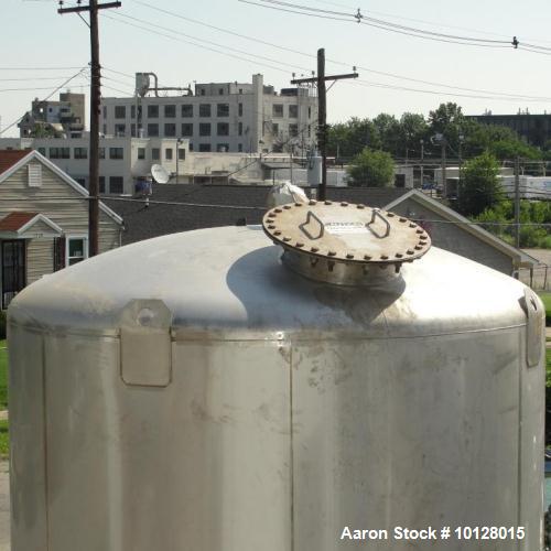 Used- Walker 5000 Gallon 304 Stainless Steel Vertical Tank. This tank has a dome top and a dish bottom. The tank diameter is...