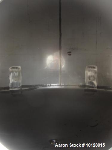 Used- Walker 5000 Gallon 304 Stainless Steel Vertical Tank. This tank has a dome top and a dish bottom. The tank diameter is...