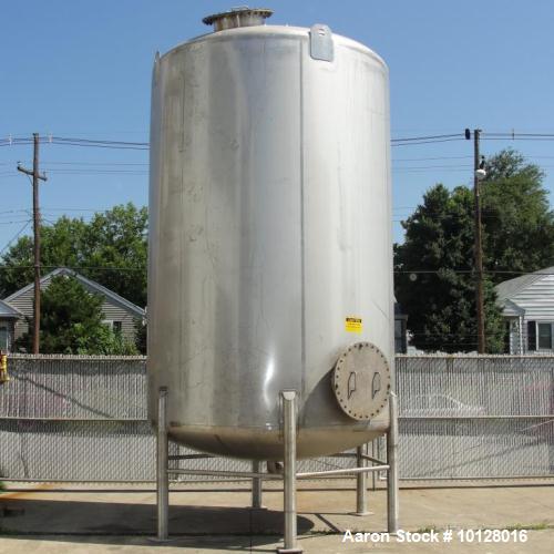 Used- Walker 5000 Gallon 304 stainless Steel Vertical Tank. This tank has a dome top and a dish bottom. The tank diameter is...