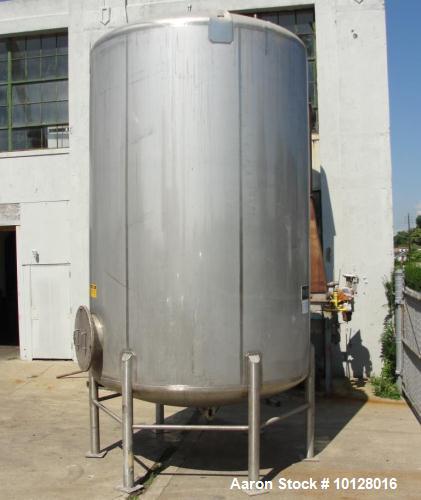 Used- Walker 5000 Gallon 304 stainless Steel Vertical Tank. This tank has a dome top and a dish bottom. The tank diameter is...