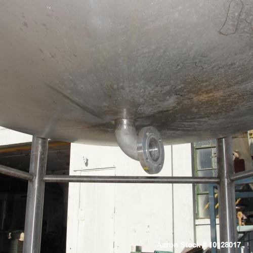 Used- Walker 5000 Gallon Vertical 304 Stainless Steel Tank. This tank has a dome top and a dish bottom. The tank diameter is...