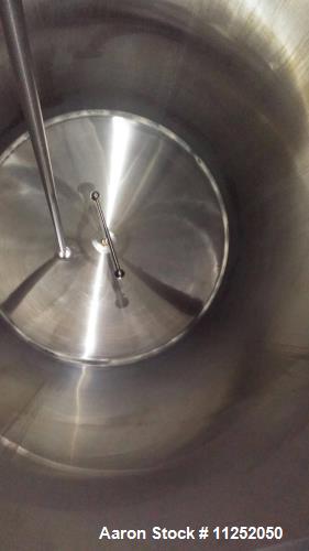 Used- Walker Stainless 6,000 Gallon Stainless Steel Jacketed Tank. Measures approximately 8' internal diameter x 16' straigh...