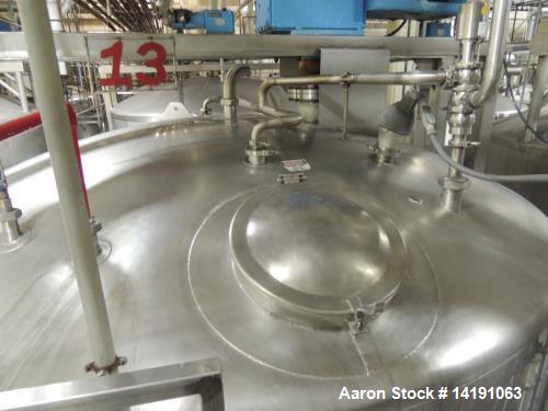 Used 10,000 Gallon Walker Stainless Steel Jacketed Mix Tank. T316 SS inner shell. T304 SS Jacket. Model 8316-6. Dimensions 136" ID x 153" straight side. 242" OAH. Jacket rated 150psi at 300F. Insulat...