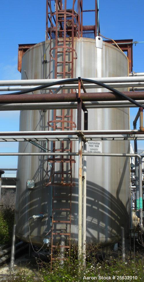 Used Walker Storage Tank, 16,000 Gallon, 316L stainless steel, vertical. Approximate 12' diameter x 18' straight side, dish top and bottom. Misc top and side flanged openings. Side openings include a...