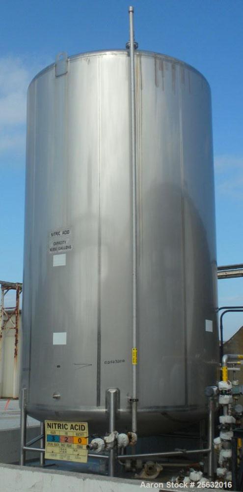Used Walker Storage Tank, 10,000 Gallon, 316L Stainless Steel, Vertical. Approximate 9'6" diameter x 16' straight side, dish top and bottom. Misc top and side flanged openings. Side openings include ...
