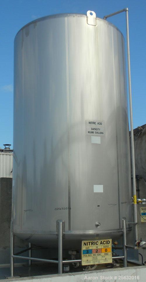 Used Walker Storage Tank, 10,000 Gallon, 316L Stainless Steel, Vertical. Approximate 9'6" diameter x 16' straight side, dish top and bottom. Misc top and side flanged openings. Side openings include ...