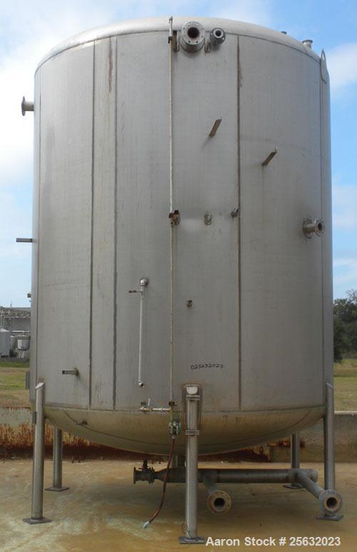 Used Walker Storage Tank, 10,000 Gallon, 304L stainless steel, vertical. Approximate 138" diameter x 144" straight side, dish top and bottom. Openings: top 3" vent, 18" manway; side 18" manway with c...