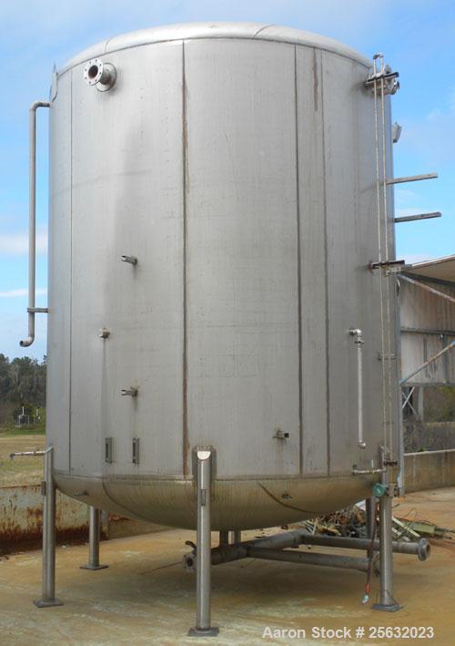 Used Walker Storage Tank, 10,000 Gallon, 304L stainless steel, vertical. Approximate 138" diameter x 144" straight side, dish top and bottom. Openings: top 3" vent, 18" manway; side 18" manway with c...