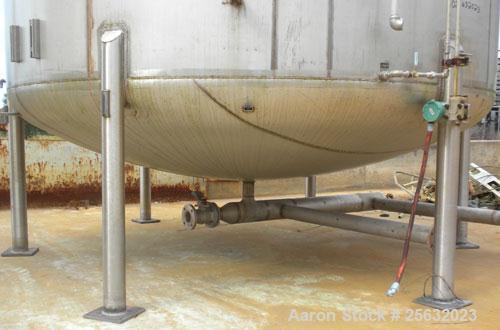 Used Walker Storage Tank, 10,000 Gallon, 304L stainless steel, vertical. Approximate 138" diameter x 144" straight side, dish top and bottom. Openings: top 3" vent, 18" manway; side 18" manway with c...