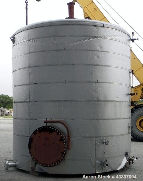 Used Walker Stainless Tank, 8500 Gallon, 304 Stainless Steel, Vertical. Approximate 132” diameter x 144” straight side, coned top, flat bottom. Top entering disperser, approximate 1-1/2” diameter x 8...