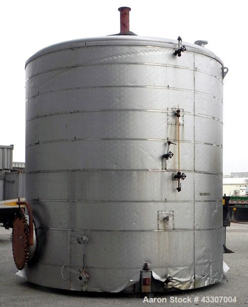 Used Walker Stainless Tank, 8500 Gallon, 304 Stainless Steel, Vertical. Approximate 132” diameter x 144” straight side, coned top, flat bottom. Top entering disperser, approximate 1-1/2” diameter x 8...