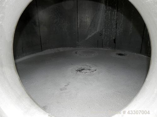 Used Walker Stainless Tank, 8500 Gallon, 304 Stainless Steel, Vertical. Approximate 132” diameter x 144” straight side, coned top, flat bottom. Top entering disperser, approximate 1-1/2” diameter x 8...