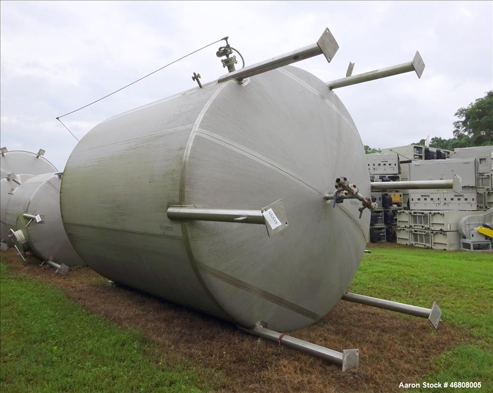Used Walker Stainless Tank, 7500 Gallon, 304L Stainless Steel, Vertical. 132" Diameter x 144" straight side, dished top and bottom. Openings top 1", 2", (2) 3", 24" man way. Side (3) 1", 3", side bot...