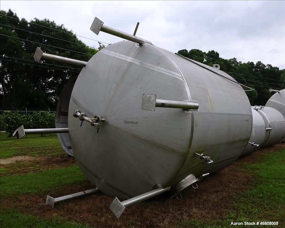 Used Walker Stainless Tank, 7500 Gallon, 304L Stainless Steel, Vertical. 132" Diameter x 144" straight side, dished top and bottom. Openings top 1", 2", (2) 3", 24" man way. Side (3) 1", 3", side bot...