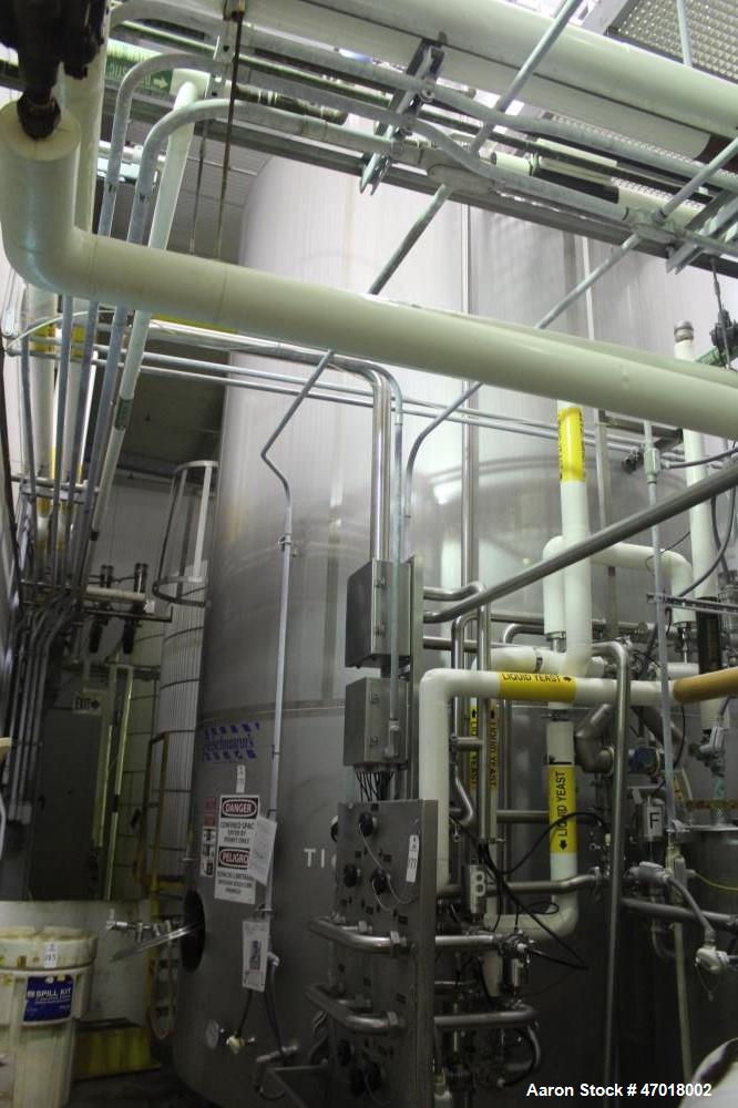 Used Walker 12,000 Gallon Jacketed Agitated Stainless Steel Tank.