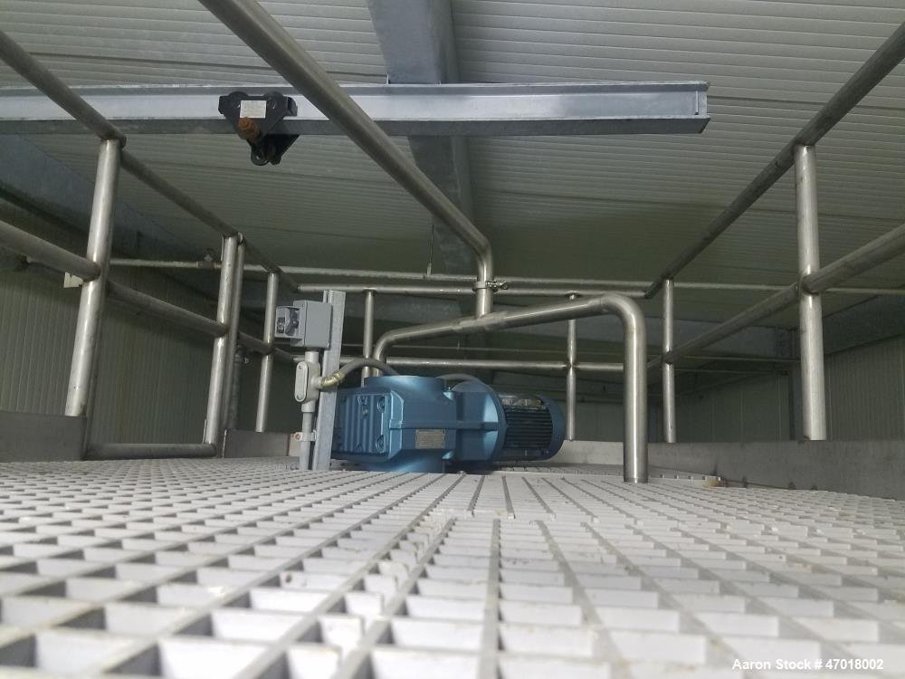 Used Walker 12,000 Gallon Jacketed Agitated Stainless Steel Tank.