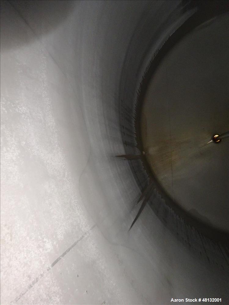 Used Walker Stainless Equipment, 10,000 Gallon Vertical Tank.