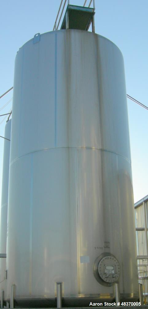Used- Walker 21,000 Gallon, Type 304L Stainless Steel, Storage Tank. Vertical, dished heads, approximate 12' diameter x 24' ...