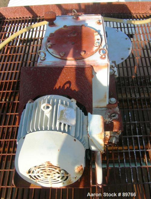 USED: Walker 16,000 gallon, type 316L stainless steel, storage/mix tank. Vertical, dished heads. Approximate 12' diameter x 18' straight side. Misc top and side flanged openings. Side openings includ...