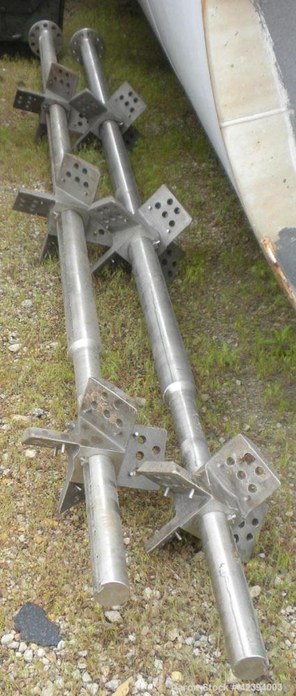 Used Wolfe Mechanical and Equipment Tank, 14,000 gallon, 304L stainless steel, vertical. Approximately 144" diameter x 192" straight side, dished top, sloped bottom. Internal rated 5 psi at 150 deg F...