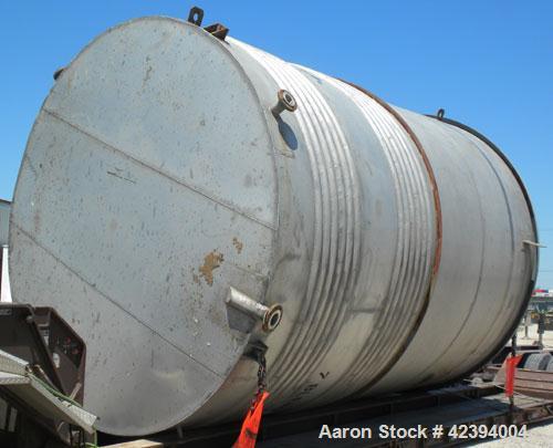 Used Wolfe Mechanical and Equipment Tank, 14,000 gallon, 304L stainless steel, vertical. Approximately 144" diameter x 192" straight side, dished top, sloped bottom. Internal rated 5 psi at 150 deg F...