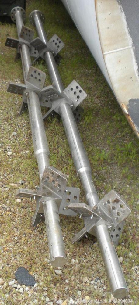 Used Wolfe Mechanical and Equipment Tank, 14,000 gallon, 304L stainless steel, vertical. Approximately 144" diameter x 192" straight side, dished top, sloped bottom. Internal rated 5 psi at 150 deg F...