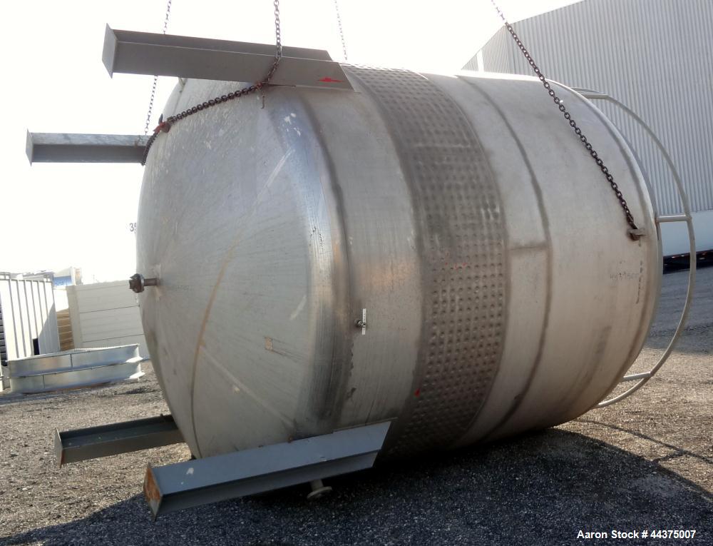 Used Wolfe Mechanical And Equipment Tank, 9000 Gallon, 304 Stainless Steel, Vertical. 144” diameter x 120” straight side, dished top and bottom. Internal rated 2.5 psi at 400 degrees F., 30” Wide sin...