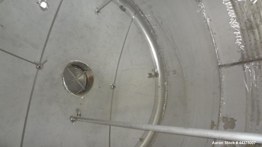 Used Wolfe Mechanical And Equipment Tank, 9000 Gallon, 304 Stainless Steel, Vertical. 144” diameter x 120” straight side, dished top and bottom. Internal rated 2.5 psi at 400 degrees F., 30” Wide sin...