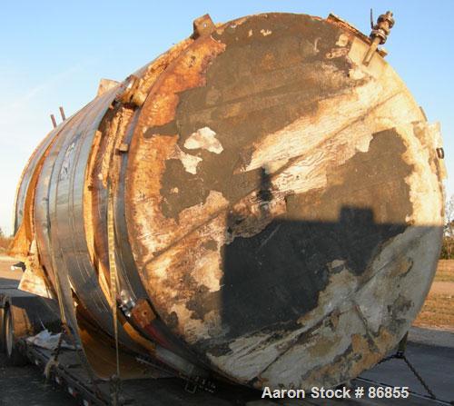 Used Wolfe Mechanical and Equipment Tank, 7,660 Gallon, 304L Stainless Steel, Vertical. Approximate 120" diameter x 156" straight side. Dish top, flat bottom. Openings: top (3) 3", 1-1/2"; side 3/4",...