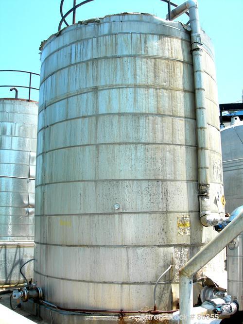 Used Wolfe Mechanical and Equipment Tank, 7,660 Gallon, 304L Stainless Steel, Vertical. Approximate 120" diameter x 156" straight side. Dish top, flat bottom. Openings: top (3) 3", 1-1/2"; side 3/4",...