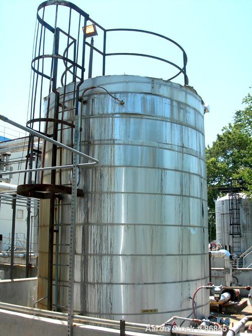 Used Wolfe Mechanical and Equipment Tank, 7,660 Gallon, 304L Stainless Steel, Vertical. Approximate 120" diameter x 156" straight side. Dish top, flat bottom. Openings: top (3) 3", 1-1/2"; side 3/4",...