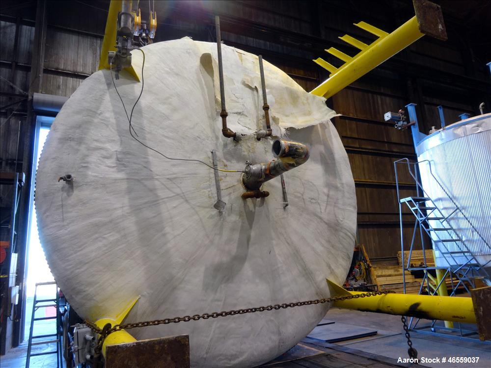 Used Zero Manufacturing Mixing Tank, Model ZS, 6,000 Gallon, 316 Stainless Steel, Vertical. Approximate 120" diameter x 112" straight side. Single Shell, Insulated, dished top and bottom. Carbon stee...