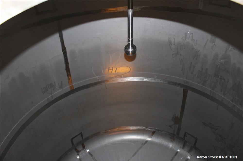 Used Zero Manufacturing Tank, Model ZS, 6,000 Gallon, 316 Stainless Steel, Vertical. Approximate 120" diameter x 112" straight side. Single shell, insulated, dished top and bottom. Opening top: 24" m...