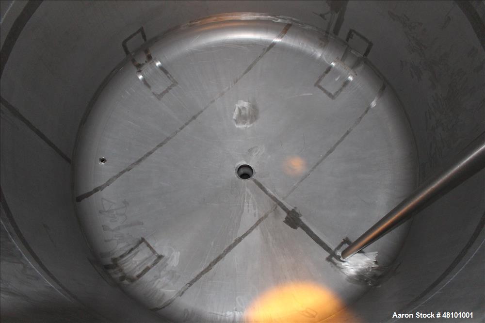Used Zero Manufacturing Tank, Model ZS, 6,000 Gallon, 316 Stainless Steel, Vertical. Approximate 120" diameter x 112" straight side. Single shell, insulated, dished top and bottom. Opening top: 24" m...