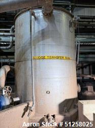 Used 7,600 Gallon Vertical Stainless Steel Tank. 316L Stainless steel. Approximately 10' diameter x 13' tall. Side manway. S...