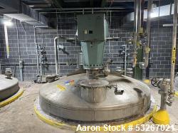 Used- IPSCO approximately 9300 gallon 304 stainless steel vertical mix tank. 138" diameter X 144" high straight side. Intern...