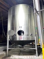Used-JV Northwest 10,000 Gallon Stainless Steel Tank with cone bottom. Vessel measures 144" diameter x 138" straight side wi...