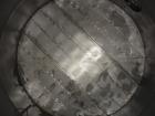 Used 12,000 Gallon Vertical Stainless Steel Tank.