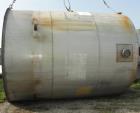 Used- 11,900 Gallon Vertical Stainless Steel Tank. Interior dimensions 140