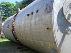 Used-Approximate 10,000 gallon vertical 304 stainless steel tank. 10' Diameter x 16' straight side. With flat top and sloped...