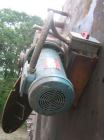 Used Approximate 10,000 gallon vertical 304 stainless steel tank. 11' Diameter x 15' straight side. With flat top and slope bottom heads.