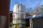 Used- 15,000 Gallon (Approximately) Stainless Steel Tank. Dished top, cone bottom. 12 foot diameter x 20 foot straight side....
