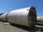 Used-Approximately 15,000 Gallon Vertical 304 Stainless Steel Tank