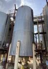 Approx 22,000 gal (80 cu m3) Vertical 304L Stainless Steel Mix Tank.