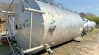 Used-Stainless Steel Tank.  Approximately 7,000 gallon; 9' diameter x 15' straight side; Vetical; Slight coned top and botto...